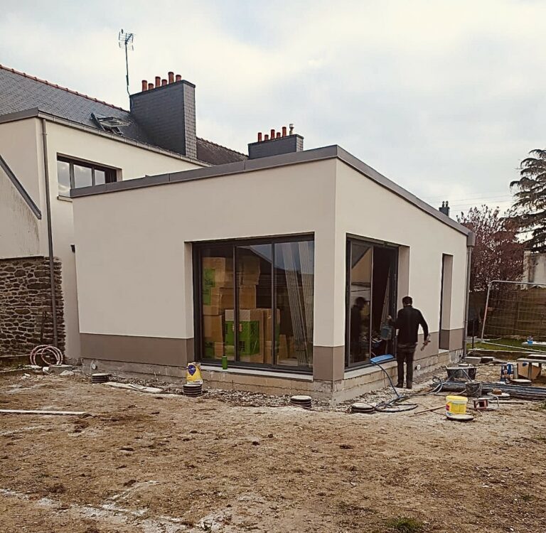 Extension et Bâti extérieur • Réalisation d’une cour en dalles